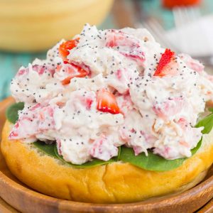 This Strawberry Poppy Seed Chicken Salad is packed with shredded chicken, a light dressing of Greek yogurt and mayo, and bursting with juicy strawberries and poppy seeds. This dish is fresh, flavorful, and filled with just the right amount of sweetness!