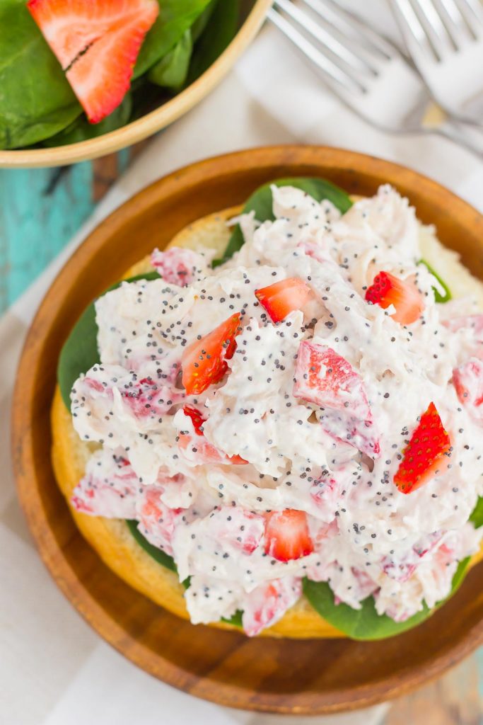 This Strawberry Poppy Seed Chicken Salad is packed with shredded chicken, a light dressing of Greek yogurt and mayo, and bursting with juicy strawberries and poppy seeds. This dish is fresh, flavorful, and filled with just the right amount of sweetness!