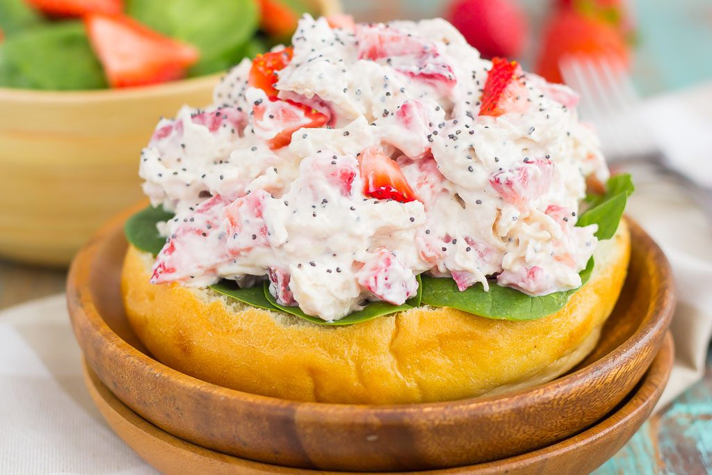 This Strawberry Poppy Seed Chicken Salad is packed with shredded chicken, a light dressing of Greek yogurt and mayo, and bursting with juicy strawberries and poppy seeds. This dish is fresh, flavorful, and filled with just the right amount of sweetness!