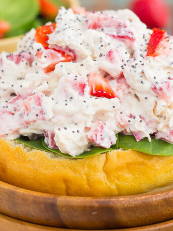 This Strawberry Poppy Seed Chicken Salad is packed with shredded chicken, a light dressing of Greek yogurt and mayo, and bursting with juicy strawberries and poppy seeds. This dish is fresh, flavorful, and filled with just the right amount of sweetness!