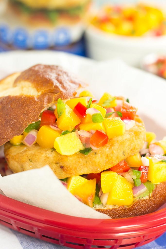 These Alaskan Pollock Burgers with Peach Mango Salsa are easy to prepare and bursting with flavor. The Alaskan Pollock patty provides a mild taste, while the peach mango salsa gives it the perfect touch of sweet and spicy. If you're looking for a new burger filed with the tastes of summer, then this is it!