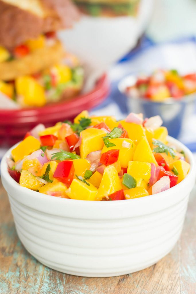 These Alaskan Pollock Burgers with Peach Mango Salsa are easy to prepare and bursting with flavor. The Alaskan Pollock patty provides a mild taste, while the peach mango salsa gives it the perfect touch of sweet and spicy. If you're looking for a new burger filed with the tastes of summer, then this is it!