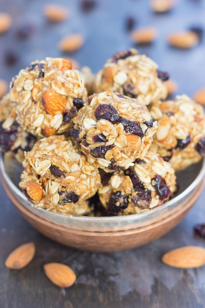 These Blueberry Almond Butter Energy Bites are packed with healthier ingredients to make an easy, on-the-go breakfast or snack. Filled with hearty oats, dried blueberries, chia seeds, honey, and almond butter, these bites take just minutes to make and are full of flavor!