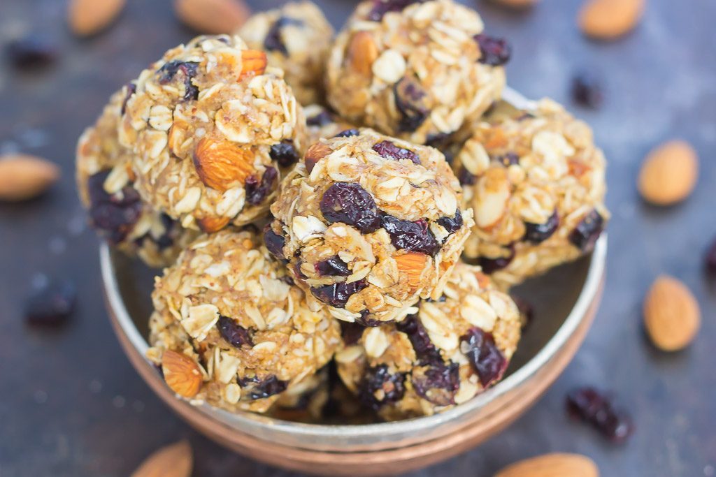 These Blueberry Almond Butter Energy Bites are packed with healthier ingredients to make an easy, on-the-go breakfast or snack. Filled with hearty oats, dried blueberries, chia seeds, honey, and almond butter, these bites take just minutes to make and are full of flavor!