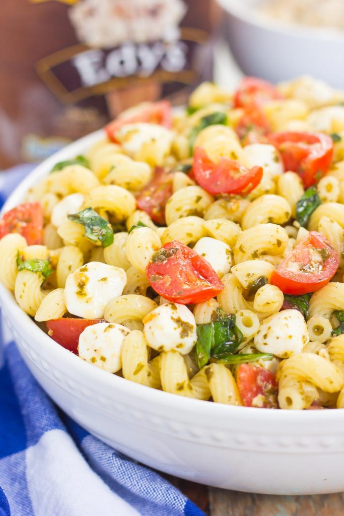 bowl of caprese pasta salad in front of pint of Edy's ice cream