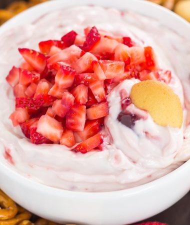 This no-bake, Greek Yogurt Strawberry Cheesecake Dip tastes just like your favorite cheesecake, in healthier form. With just five ingredients and hardly any prep time, you can have this easy dessert ready in less than 10 minutes. It's perfect to serve with some fresh fruit or pretzels, and makes a tasty dish for your summer parties or just for when you want something sweet!