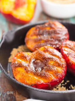 These Grilled Peaches with Cinnamon and Brown Sugar are a delicious, healthier dessert. Fresh peaches are lightly grilled and then topped with a cinnamon and brown sugar mixture that caramelizes to perfection. With just four ingredients and hardly any prep time, you can have this easy dish ready in minutes!