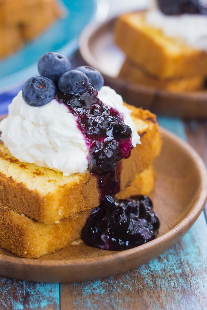 This Grilled Pound Cake with Mascarpone Cream and Blueberries is an easy dessert that's perfect for summer. Slices of pound cake are lightly grilled and topped with mascarpone whipped cream and blueberries. Fast, fresh, and simple to prepare, this dish is ready in less than 20 minutes and is sure to be a crowd-pleaser!