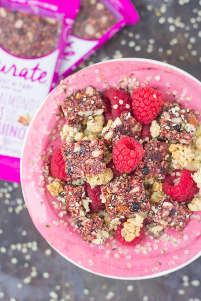 This Raspberry Almond Butter Smoothie Bowl is a delicious way to start your mornings off right. Packed with sweet raspberries, Greek yogurt, and almond butter, this bowl is bursting with flavor and just the right amount nutritious ingredients. Top this dish with a Curate Bar, granola, fruit, and more for a healthy breakfast or mid-morning snack!