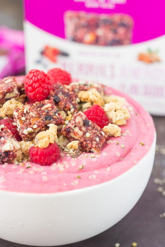 This Raspberry Almond Butter Smoothie Bowl is a delicious way to start your mornings off right. Packed with sweet raspberries, Greek yogurt, and almond butter, this bowl is bursting with flavor and just the right amount nutritious ingredients. Top this dish with a Curate Bar, granola, fruit, and more for a healthy breakfast or mid-morning snack!