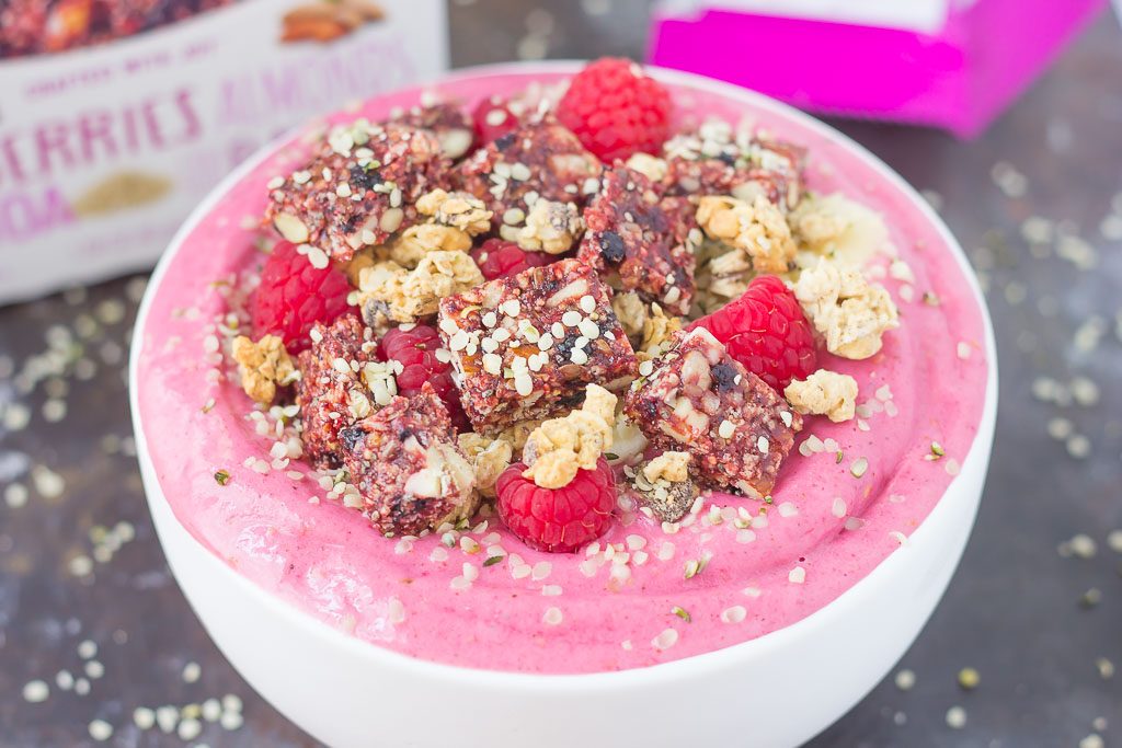 This Raspberry Almond Butter Smoothie Bowl is a delicious way to start your mornings off right. Packed with sweet raspberries, Greek yogurt, and almond butter, this bowl is bursting with flavor and just the right amount nutritious ingredients. Top this dish with a Curate Bar, granola, fruit, and more for a healthy breakfast or mid-morning snack!