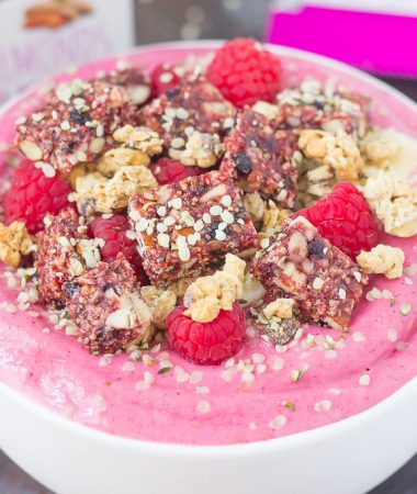 This Raspberry Almond Butter Smoothie Bowl is a delicious way to start your mornings off right. Packed with sweet raspberries, Greek yogurt, and almond butter, this bowl is bursting with flavor and just the right amount nutritious ingredients. Top this dish with a Curate Bar, granola, fruit, and more for a healthy breakfast or mid-morning snack!