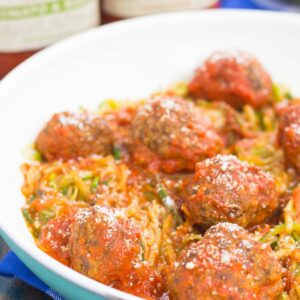 These Tomato Basil Zoodles with Meatballs makes a simple, fresh, and easy weeknight meal. Filled with fresh zucchini noodles, a tomato basil marinara sauce, and hearty meatballs, this dish comes together in minutes and is bursting with flavor!