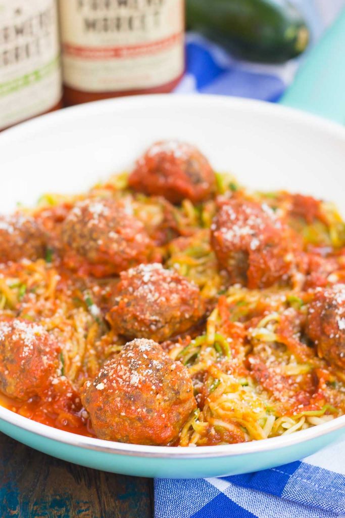 A skillet of zoodles and meatballs. 