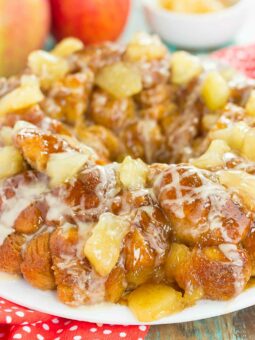 This Apple Pie Monkey Bread is a deliciously sweet and easy dish that makes the perfect breakfast or dessert! With just a few and minimal prep time, this pull-apart bread is soft, gooey, and bursting with apple chunks and warm spices. One bit and this will become your favorite fall treat!