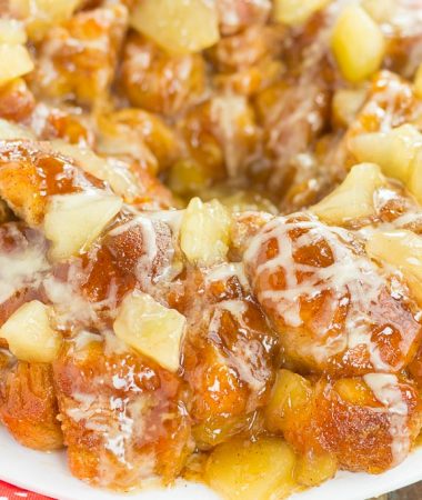 This Apple Pie Monkey Bread is a deliciously sweet and easy dish that makes the perfect breakfast or dessert! With just a few and minimal prep time, this pull-apart bread is soft, gooey, and bursting with apple chunks and warm spices. One bit and this will become your favorite fall treat!