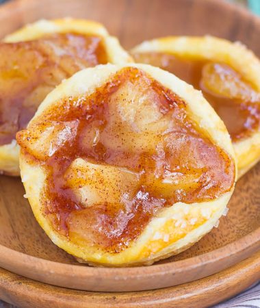 These Caramel Apple Danish are filled with tender apples that are sprinkled with cinnamon and brown sugar, and then topped with a rich, caramel sauce. Made from a puff pastry base and simple ingredients, you can have this easy breakfast or dessert ready in less than 30 minutes!