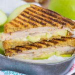 This Turkey, Apple and Brie Panini is the perfect fall-inspired sandwich. It's packed with fresh turkey, granny smith apples, creamy brie cheese and then toasted until golden. Simple, fast, and bursting with flavor, this sweet and savory combo makes a delicious lunch or dinner!