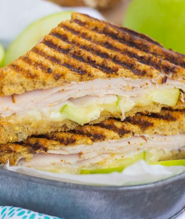 This Turkey, Apple and Brie Panini is the perfect fall-inspired sandwich. It's packed with fresh turkey, granny smith apples, creamy brie cheese and then toasted until golden. Simple, fast, and bursting with flavor, this sweet and savory combo makes a delicious lunch or dinner!