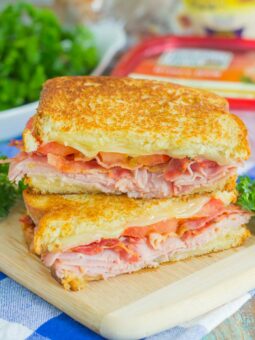 Thinly sliced honey ham, swiss cheese, fresh tomatoes, and crispy bacon are packed between fresh slices of bread that are grilled to perfection. With just six ingredients and hardly any prep work, you can have this Grilled Ham and Swiss Sandwich ready to be devoured in no time!