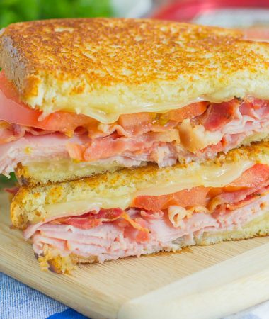 Thinly sliced honey ham, swiss cheese, fresh tomatoes, and crispy bacon are packed between fresh slices of bread that are grilled to perfection. With just six ingredients and hardly any prep work, you can have this Grilled Ham and Swiss Sandwich ready to be devoured in no time!