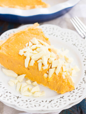 This Pumpkin White Chocolate Pie is filled with a creamy mixture of pumpkin and white chocolate pudding that's swirled to perfection. It's smooth, silky, and an easy, no-bake dessert!