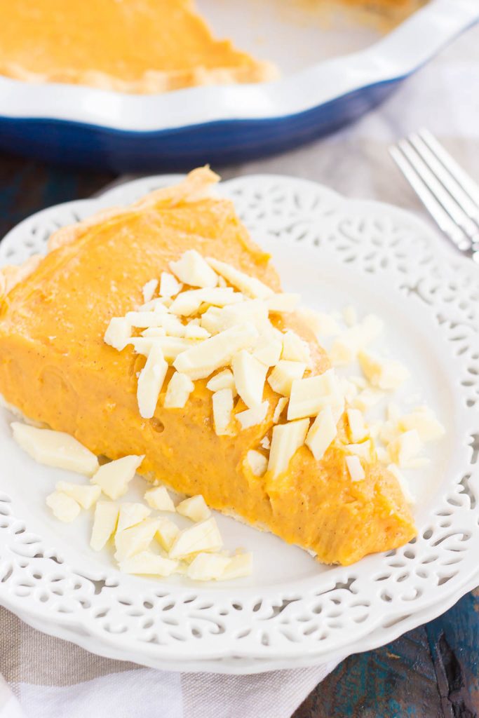 This Pumpkin White Chocolate Pie is filled with a creamy mixture of pumpkin and white chocolate pudding that's swirled to perfection. It's smooth, silky, and an easy, no-bake dessert! #nobake #nobakedesserts #nobakepies #pumpkinpie #whitechocolate #dessert #falldessert #fallrecipe #pumpkinrecipes