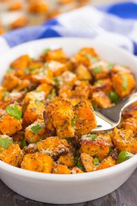 zoomed in shot of fork lifting savory sweet potatoes