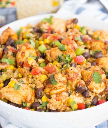 These Southwest Chicken and Rice bowls are packed with flavor and perfect for weeknight meals. Filled with tender chicken, brown rice, bell peppers, corn, black beans, and a mixture of spices, this zesty dish is simple to prepare and ready in no time!