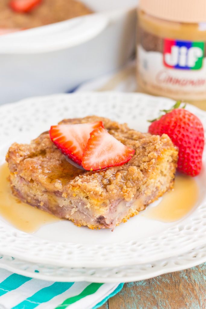 This Strawberry Cinnamon Pancake Casserole is a dish that the whole family will enjoy. Fluffy pancakes are studded with juicy strawberries, a cinnamon spread, and then baked until golden. Topped sweet streusel and maple syrup, this dish is a wholesome, feel-good meal!