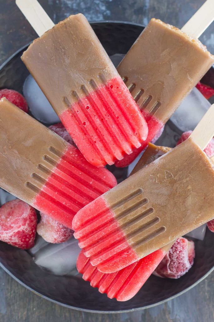 These Strawberry Mocha Pops are filled with mocha iced coffee and topped with a sweet strawberry layer. With just a few ingredients and hardly any prep work, this is the perfect treat to satisfy you sweet tooth!