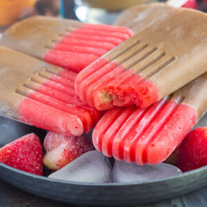 These Strawberry Mocha Pops are filled with mocha iced coffee and topped with a sweet strawberry layer. With just a few ingredients and hardly any prep work, this is the perfect treat to satisfy you sweet tooth!