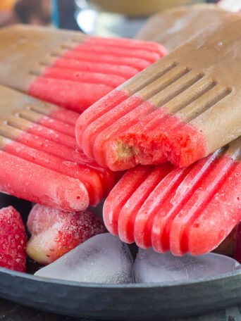 These Strawberry Mocha Pops are filled with mocha iced coffee and topped with a sweet strawberry layer. With just a few ingredients and hardly any prep work, this is the perfect treat to satisfy you sweet tooth!