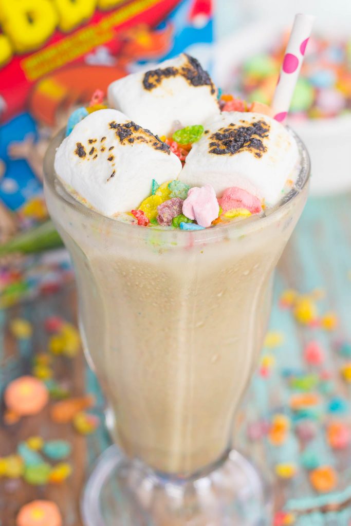 This Toasted Marshmallow Fruity Pebble Milkshake is loaded with creamy vanilla ice cream, a swirl of cereal, and topped with toasted marshmallows. With just four ingredients and hardly any prep time, you can indulge in this delicious frozen treat to beat the summer heat!