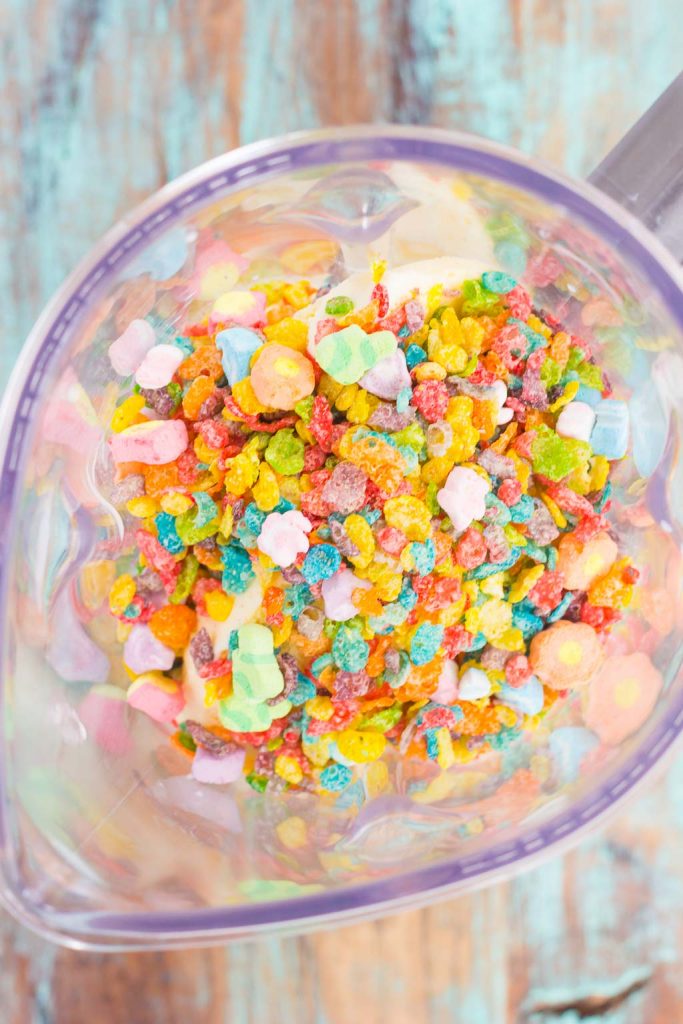 This Toasted Marshmallow Fruity Pebble Milkshake is loaded with creamy vanilla ice cream, a swirl of cereal, and topped with toasted marshmallows. With just four ingredients and hardly any prep time, you can indulge in this delicious frozen treat to beat the summer heat!