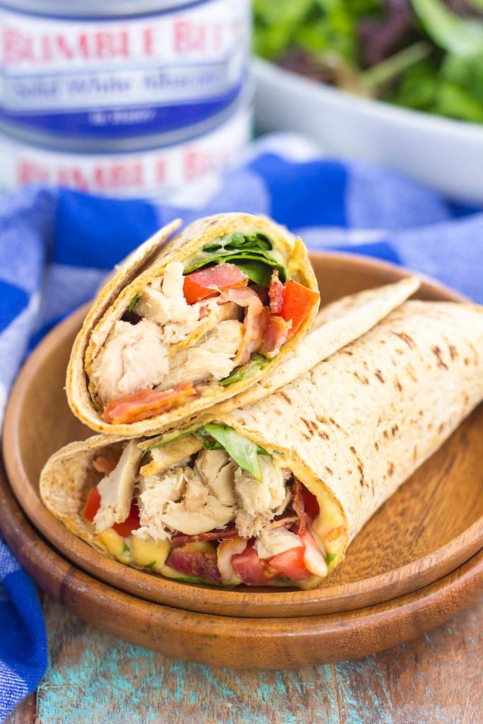 This Tuna Spinach Wrap is filled with hearty tuna, fresh spinach, crisp bacon, and tomatoes. Simple, fresh and easy to make, this dish comes together in minutes and serves as a perfect lunch or dinner for back-to-school times!