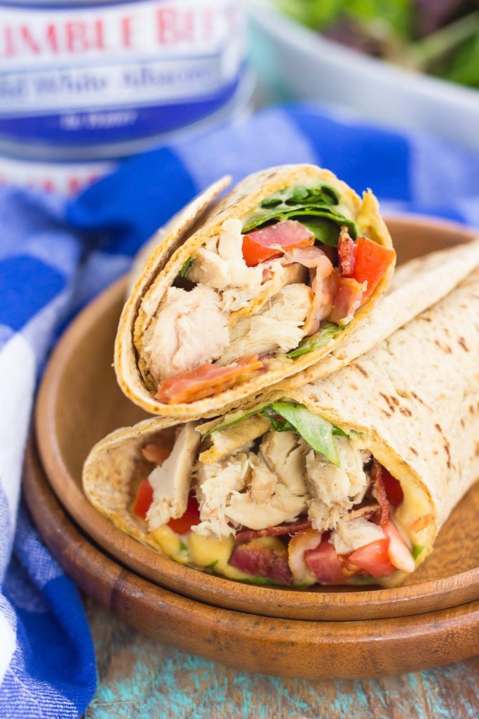 This Tuna Spinach Wrap is filled with hearty tuna, fresh spinach, crisp bacon, and tomatoes. Simple, fresh and easy to make, this dish comes together in minutes and serves as a perfect lunch or dinner for back-to-school times!