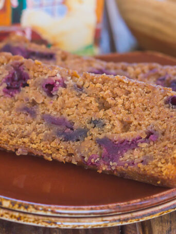 This Blueberry Gingerbread Loaf is soft, moist, and loaded with fresh blueberries and cozy spices. Easy to make and bursting with the flavors of the season, this bread makes a delicious breakfast or dessert for your hungry house guests!