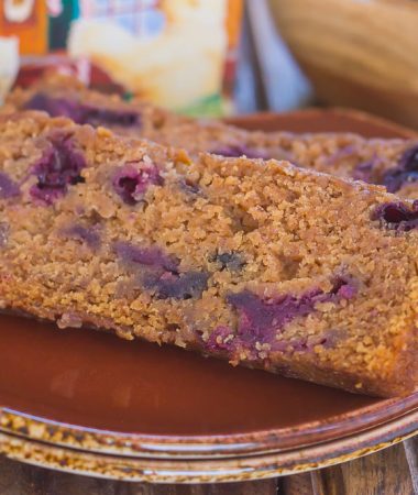 This Blueberry Gingerbread Loaf is soft, moist, and loaded with fresh blueberries and cozy spices. Easy to make and bursting with the flavors of the season, this bread makes a delicious breakfast or dessert for your hungry house guests!