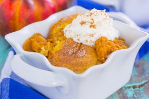 pumpkin cobbler in a white serving dish