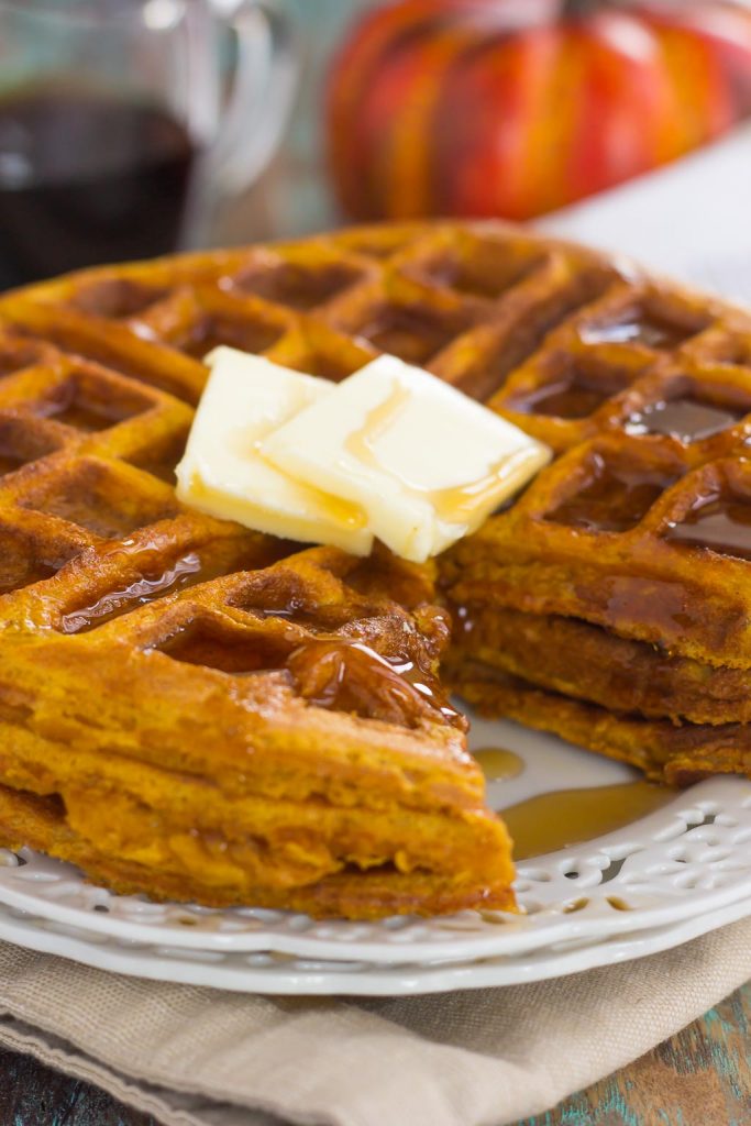 These Pumpkin Spice Waffles are crispy on the outside, tender on the inside, and filled with cozy fall flavors. You can satisfy your craving for pumpkin with this easy breakfast that's sure to be a favorite all year long!