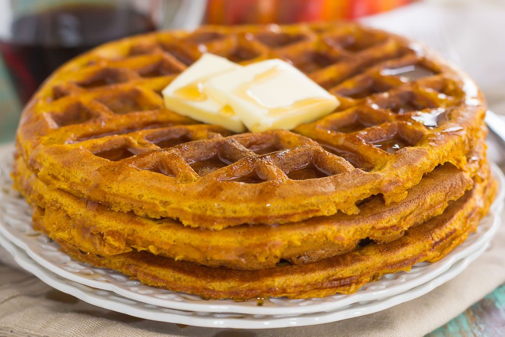 These Pumpkin Spice Waffles are crispy on the outside, tender on the inside, and filled with cozy fall flavors. You can satisfy your craving for pumpkin with this easy breakfast that's sure to be a favorite all year long!