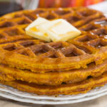 These Pumpkin Spice Waffles are crispy on the outside, tender on the inside, and filled with cozy fall flavors. You can satisfy your craving for pumpkin with this easy breakfast that's sure to be a favorite all year long!