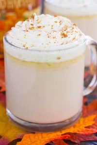 This Slow Cooker Pumpkin Caramel White Hot Chocolate is a deliciously sweet and creamy drink that's bursting with fall flavors. It's a perfect recipe to enjoy on a chilly evening and is so easy to make! Keep your crock pot on warm to impress those party guests! #pumpkin #pumpkindrink #pumpkinhotchocolate #pumpkinwhitehotchocolate #whitehotchocolate #hotchocolaterecipe #falldrink #drink #hotbeverage #hotchocolaterecipes #pumpkincaramelhotchocolate