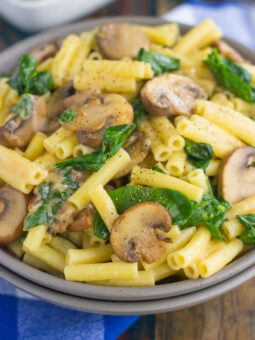 This Garlic Parmesan Pasta with Spinach and Mushrooms is an easy, 20 minute meal that the whole family will enjoy. Filled with fresh mushrooms, spinach, garlic and Parmesan cheese, this creamy pasta is bursting with flavor and ready in no time!