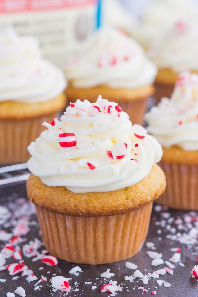 homemade vanilla cupcakes topped with a swirl of peppermint frosting 