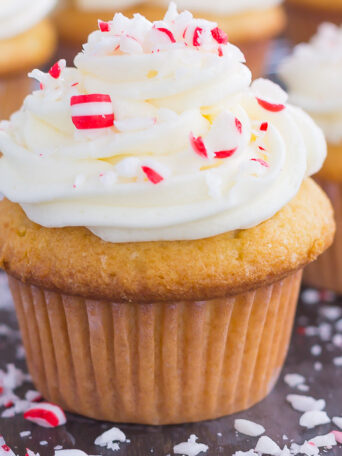 These Vanilla Cupcakes with Peppermint Frosting are light, fluffy, and topped with a sweet peppermint swirl. Easy to make and bursting with flavor, these cupcakes are the perfect sweet treat to add to your holiday baking list!