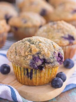 These Bakery Style Blueberry Muffins are filled with juicy blueberries that are swirled into a sweet batter and topped with a cinnamon streusel. Soft, moist, and bursting with flavor, these muffins are just as delicious as the ones that you would find at a bakery!