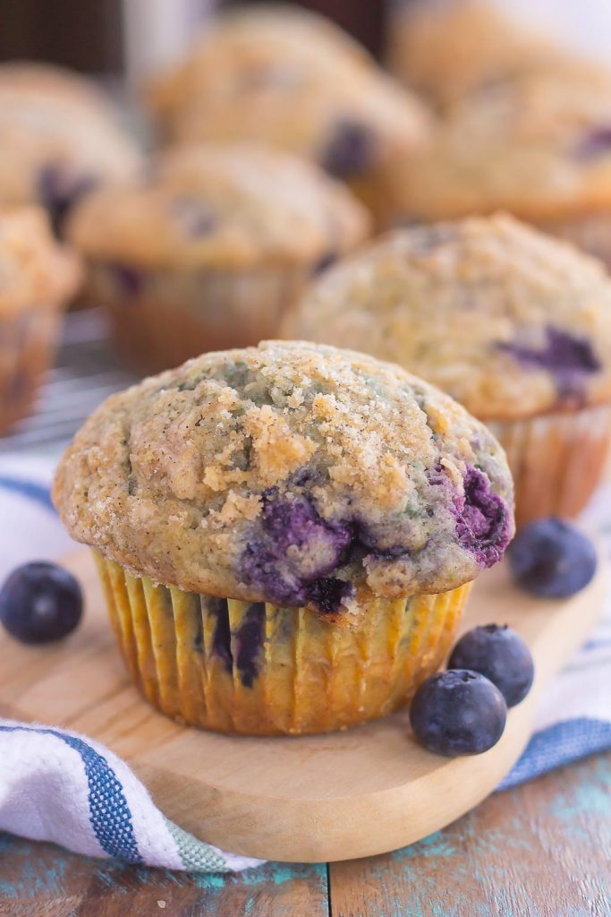 These Bakery Style Blueberry Muffins are filled with juicy blueberries that are swirled into a sweet batter and topped with a cinnamon streusel. Soft, moist, and bursting with flavor, these muffins are just as delicious as the ones that you would find at a bakery!