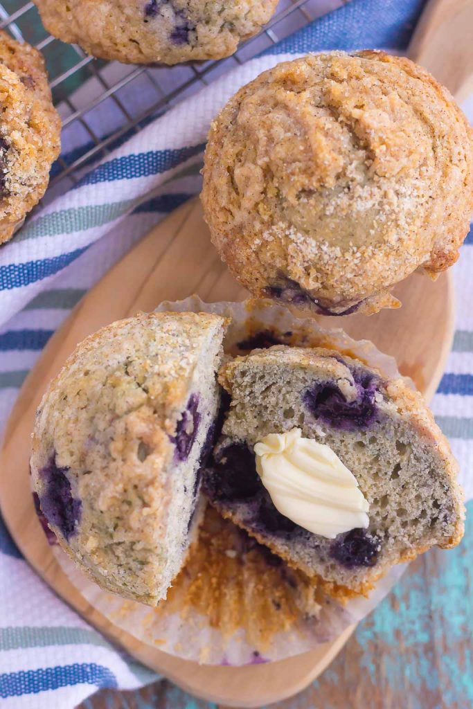 These Bakery Style Blueberry Muffins are filled with juicy blueberries that are swirled into a sweet batter and topped with a cinnamon streusel. Soft, moist, and bursting with flavor, these muffins are just as delicious as the ones that you would find at a bakery!